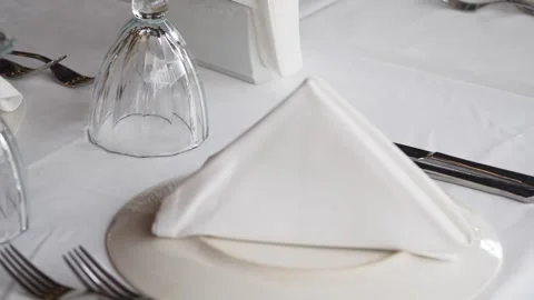 Elegant table setting at a fine dining restaurant Stock Footage 311146289
