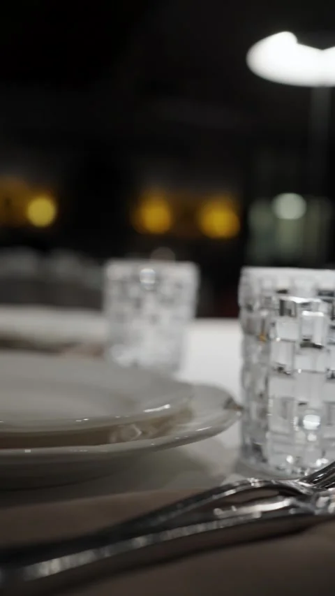 Elegant Table Setting in Fine Dining Restaurant with Crystal Glass. Close-u.. Video stock 333915075