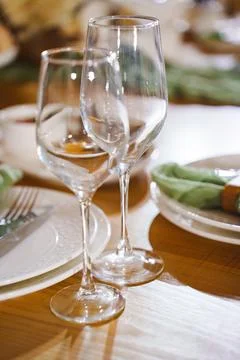 Elegant table setting with fine glasses for dining occasion Stock Photos