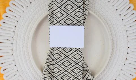 Elegant table setting with geometric napkin, place for text Foto stock