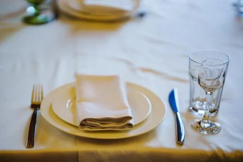 Elegant table setting with glassware and silverware Stock Photos