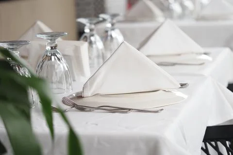 Elegant table setting in a modern restaurant space Stock Photos