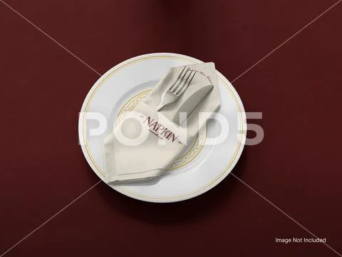Elegant Table Setting with Napkin Fork and Knife on a Plate PSD Template