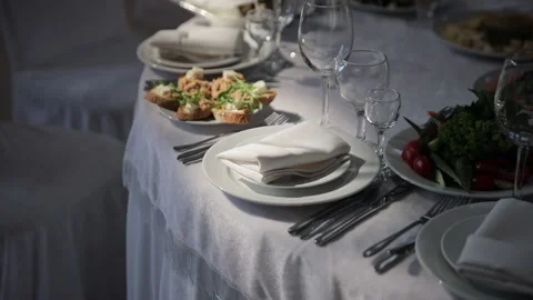 Elegant Table Setting: A Perfectly Presented Table with Glassware and Delicious Stock Footage 231402240