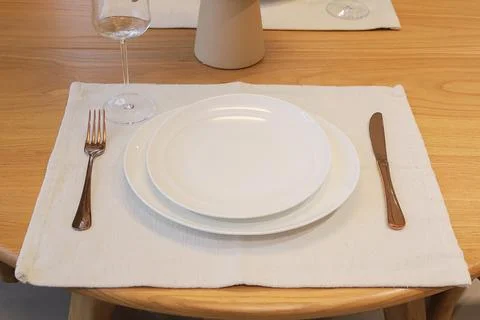 Elegant table setting with plates close-up Stock Photos