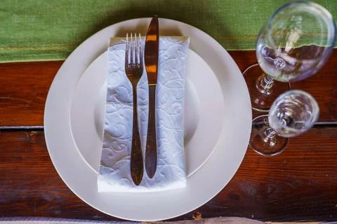 Elegant table setting with silverware and glassware Stock Photos