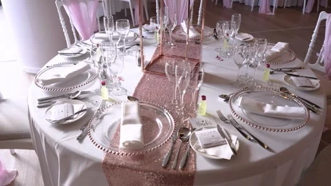 Elegant table setting for a special event in a bright indoor space Stock Footage 335262868