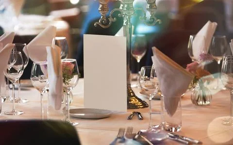 Elegant Table Setting with Wine Glasses and Candle Holder for Formal Event Stock Photos