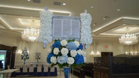 An Elegant Torah Scroll Display Featuring Beautiful Floral Decoration for Any Stock Footage 291009630