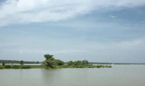 An Elegant view of an Islet between the sky and the river near Mysuru/Karnataka. Stock Photos