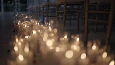 Elegant wedding aisle lined with glowing candles Stock Footage 346298770