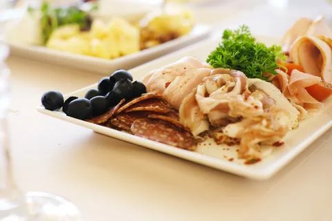 Elegant wedding menu featuring assorted appetizers on a beautifully arranged Stock Photos