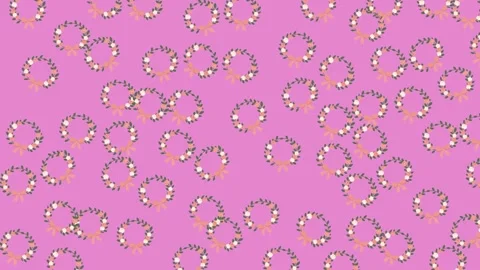 Elegant Wedding Pattern with Scattered Floral Wreaths on a Pink Background Stock Footage 345539986