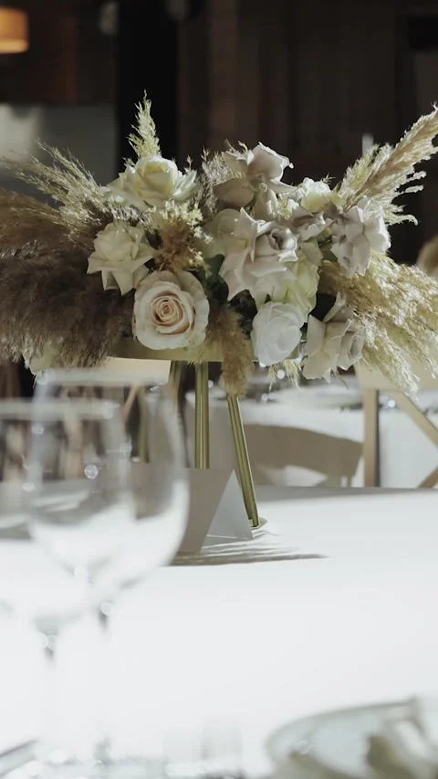 Elegant wedding reception with beautiful table setup and flowers. decorated Stock Footage 308395900