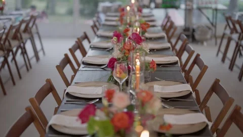 Elegant Wedding Reception Table Setting With Candles And Flowers Stock Footage 337778269