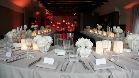 Elegant Wedding Reception Tablescape with Soft Candlelight and Floral Stock Footage 337434932