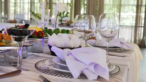 Elegant wedding table arrangement with white napkins Stock Footage 340292601