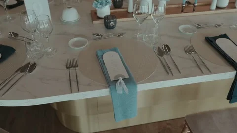 Elegant wedding table with blue napkin and menu card Stock Footage 317803429