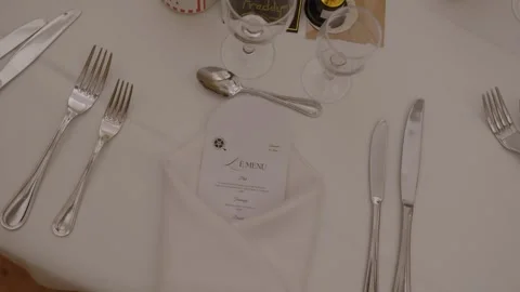 Elegant wedding table setting in Brittany France with printed menu white Stock Footage 342290228