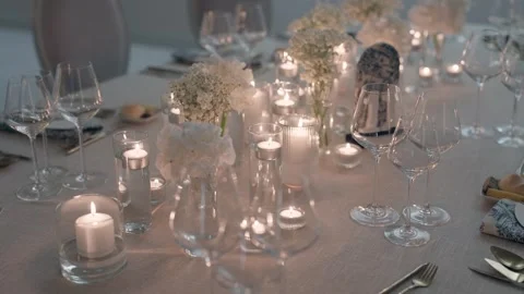 Elegant Wedding Table Setting With Candles And White Flowers Stock Footage 337777933