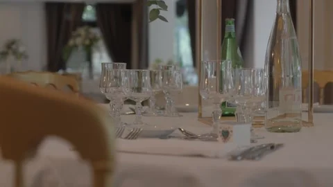 Elegant wedding table setting with glassware Stock Footage 334803403