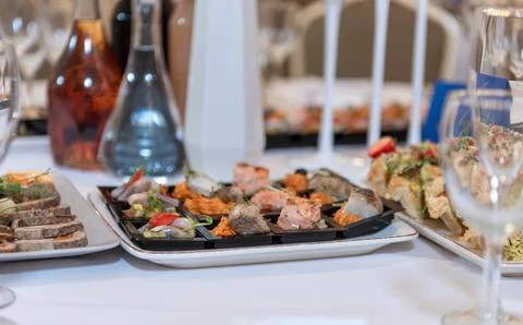 Elegant Wedding Table Setting With Gourmet Dishes and Appetizing Food Prese.. Stock Photos