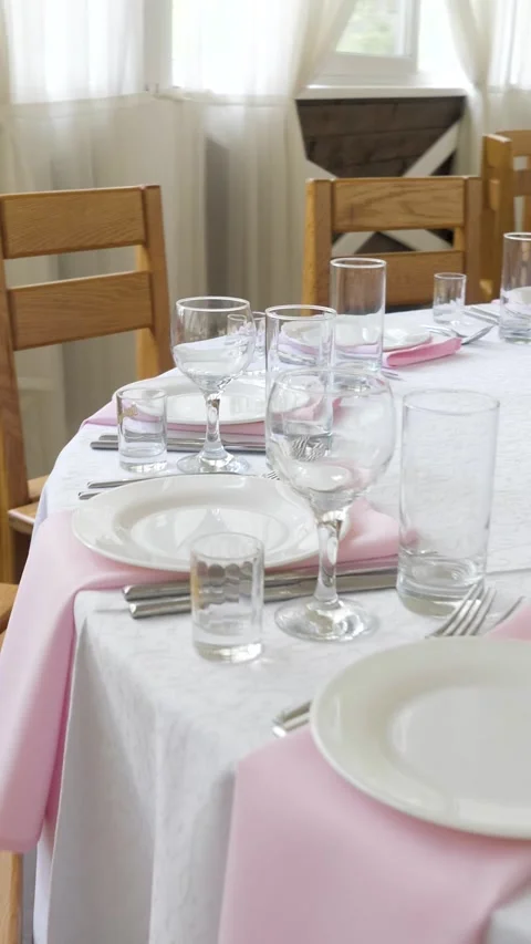 Elegant Wedding Table Setting With Pink Napkins And Glassware Stock Footage 334661643