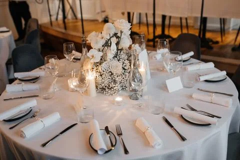 Elegant Wedding Table Setting with White Roses Stock Photos