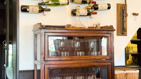 Elegant Wine Bottle Wall Rack and Glassware Cabinet in Kyoto Restaurant Vídeos de archivo 332319922