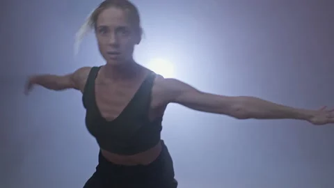 Elegant woman performing dance elements of contemporary choreography at studio. Stock Footage 150790763