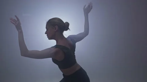 Elegant woman performing dance elements of contemporary choreography at studio. Stock Footage 163603535