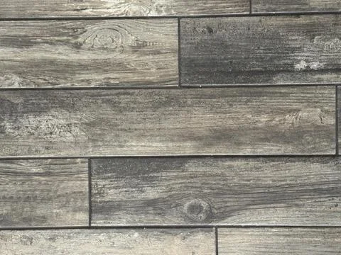 Elegant wood pattern floor tile in warm natural tones used in spa or wellne.. Stock Photos