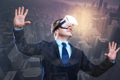 Elegant young man using virtual reality glasses Foto stock