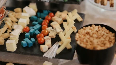 Elegantly decorated catering banquet table with different food snacks and Stock Footage 128247283