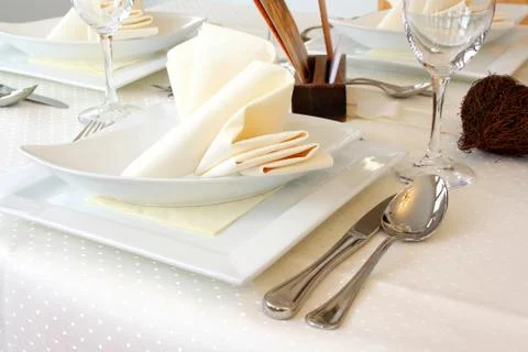 Elegantly decorated table in restaurant Stock Photos