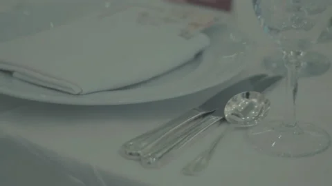 Elegantly set dining table with silverware and napkin 스톡 동영상 217513360