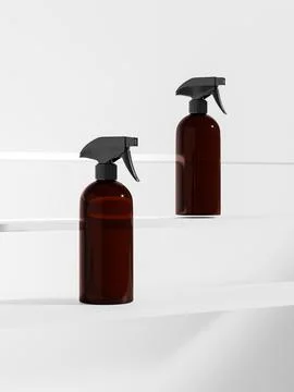 Elegent trigger spray bottle, round-shape amber glass atomizer bottle Stock Illustration
