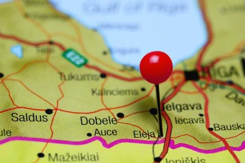 Eleja pinned on a map of Latvia Foto stock