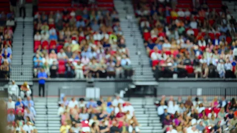 Element of Blurred crowd of spectators sitting in stadium stands during large Video stock 337983943