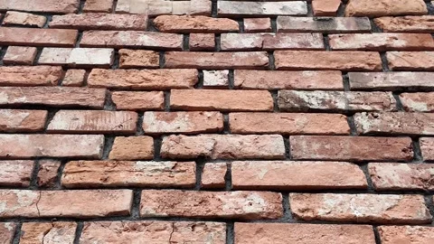 Element of a building wall covered with brown facing brick Video stock 304881432