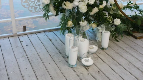 Element of Decor wedding arch. The Decor of the candles stand near the arch 스톡 동영상 198675811