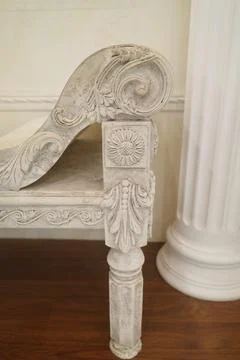 An element of an old bench made of light stone. History Stock Photos