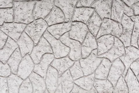 An element of a repeating cement pattern on a building as a texture Stock Photos