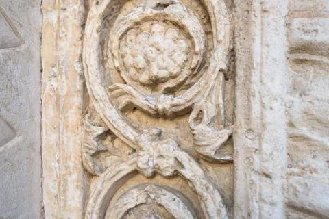 Element of the wall of an cathedral in the form of grape leaf and bunch, macro Stock Photos