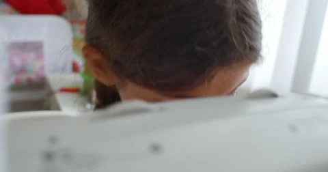 Elementary aged child sewing Stock Footage 57171101