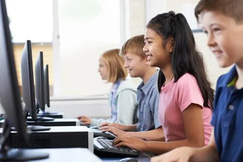 Elementary Pupils In Computer Class Stock Photos