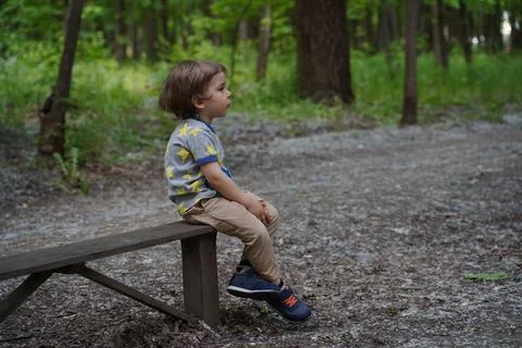 Elementary school boy looking up at the sky. Selective focus. Stock Photos