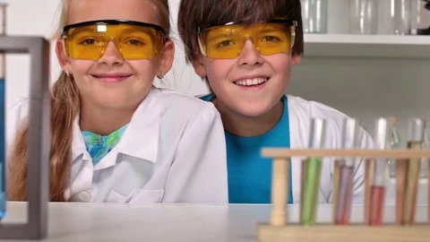 Elementary school chemistry class with smiling kids Stock Footage 72152227