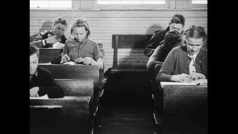 Elementary School Children In Classroom Doing School Work Stock Footage 113300514