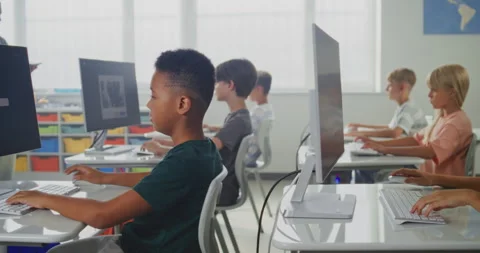 Elementary School Children Using Computers, Creating Illustrations in AI Image Stock Footage 316292734
